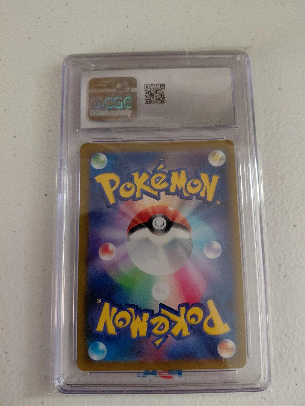 Graded Dragonite V Pokémon Card - Yellow/Green Holo CGC MINT 1O